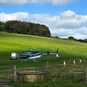 Helicopter in a Field